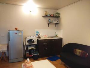 Kuchyň nebo kuchyňský kout v ubytování Renovate Room Near Impact