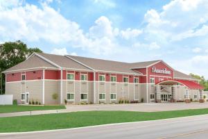 a rendering of the front of a school building at AmericInn by Wyndham Humboldt in Humboldt