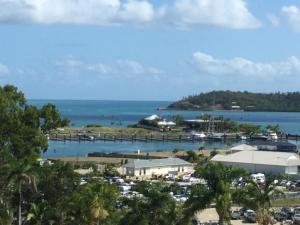 a view of a harbor with a marina at Coral Sea Vista Apartments in Airlie Beach