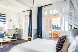 Postel nebo postele na pokoji v ubytování Hotel Palisade