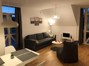 Et opholdsområde på Vakarų apartamentai