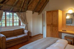 Posezení v ubytování Coral Tree Cottages