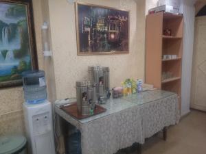 a kitchen with a table with a blender on it at Florin Hotel in Istanbul