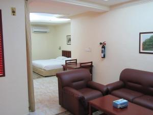 Area soggiorno di Al Ferdous Hotel Apartments