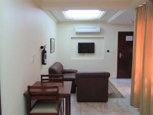 TV o dispositivi per l'intrattenimento presso Al Ferdous Hotel Apartments
