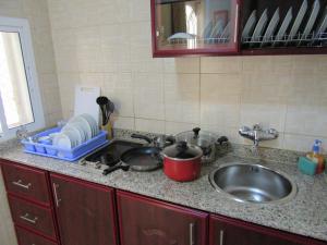 Cucina o angolo cottura di Al Ferdous Hotel Apartments