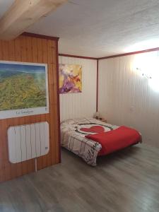 Postel nebo postele na pokoji v ubytování Le Nid Du Caveau
