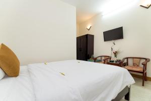 TV a/nebo společenská místnost v ubytování Hoa Thu Homestay