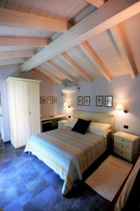Postel nebo postele na pokoji v ubytování B&B Villa Dei Pini