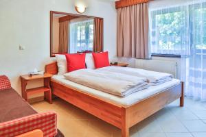 Postel nebo postele na pokoji v ubytování Hotel Pension Residence