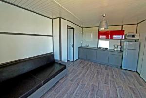 Kuchyň nebo kuchyňský kout v ubytování Camping Torraccia