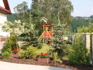 Vonkajšia záhrada v ubytovaní Hotel Ostoja