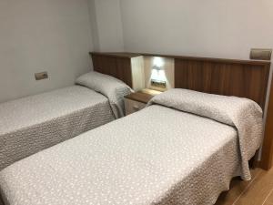 A bed or beds in a room at Illas Atlanticas