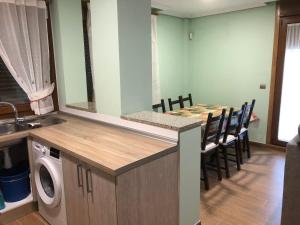 A kitchen or kitchenette at Illas Atlanticas