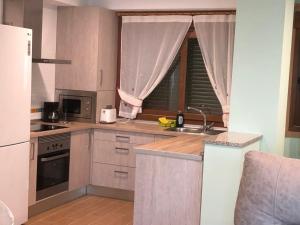 A kitchen or kitchenette at Illas Atlanticas