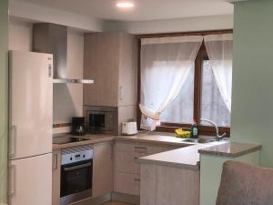 A kitchen or kitchenette at Illas Atlanticas