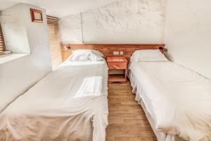 Postel nebo postele na pokoji v ubytování Clyne Farm Centre