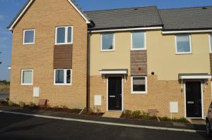 an image of a brick house at Fantastic Hampton Centre Stay in Peterborough