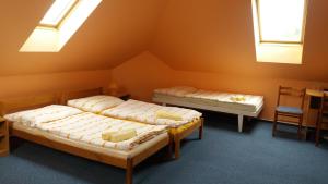 Uma cama ou camas num quarto em Dalmo