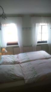 Ferienwohnung St. Wigbert tesisinde bir odada yatak veya yataklar