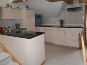 Eldhús eða eldhúskrókur á Ferienwohnung Brülisauer