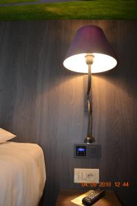 Voodi või voodid majutusasutuse Cleythil Hotel toas
