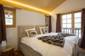 Postel nebo postele na pokoji v ubytování Tenaya