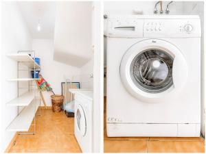 a white laundry room with a washer and dryer at Townhouse La Tejita in La Tejita