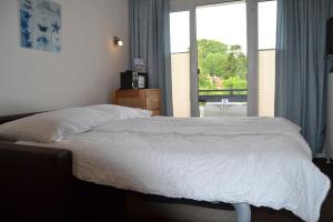 Ein Bett oder Betten in einem Zimmer der Unterkunft Haus Solaris