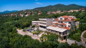 an aerial view of a building in a mountain at Hotel Laurus - Liburnia in Opatija
