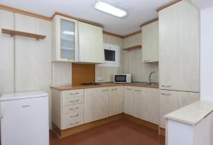 Kuchyň nebo kuchyňský kout v ubytování Apartments Mar de Tossa