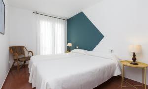 Ліжко або ліжка в номері Apartments Mar de Tossa