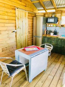 Cucina o angolo cottura di Bungalow de charme vue mer