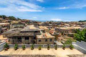 an aerial view of a city with buildings at Rans Hill Lodge in Cape Coast