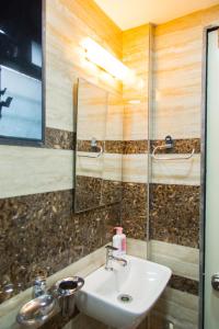 Koupelna v ubytování Hotel Tourister + 21 fotografií