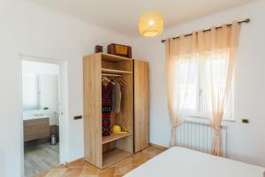 A bed or beds in a room at Vista Mare B&B