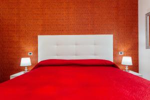 A bed or beds in a room at Vista Mare B&B