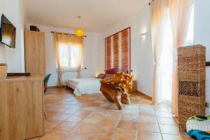 A bed or beds in a room at Vista Mare B&B