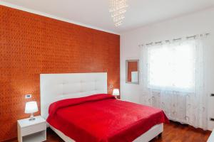 A bed or beds in a room at Vista Mare B&B
