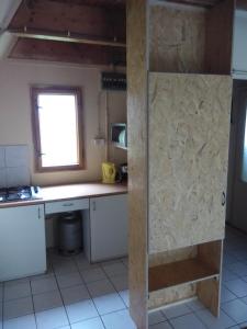 Kuchyň nebo kuchyňský kout v ubytování Camping Karolina
