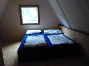 Кровать или кровати в номере Camping Karolina