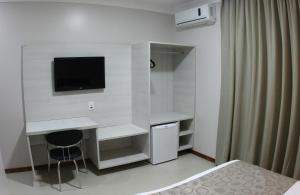 TV a/nebo společenská místnost v ubytování L´acordes Hotel