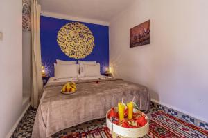 Postel nebo postele na pokoji v ubytování Riad Safran et Cannelle & Spa