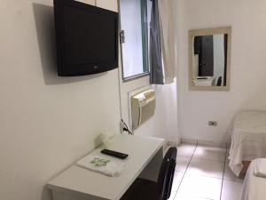 TV a/nebo společenská místnost v ubytování Grand Prix Hotel