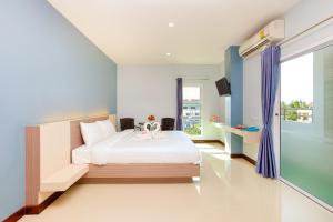Postel nebo postele na pokoji v ubytování Je T'aime Hotel