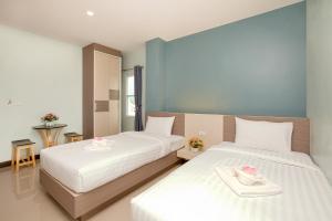 Postel nebo postele na pokoji v ubytování Je T'aime Hotel + 12 fotografií