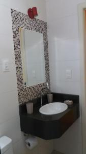 Um banheiro em Pousada Casablanca