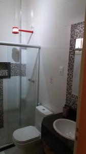Um banheiro em Pousada Casablanca