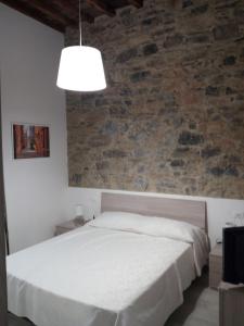 Postel nebo postele na pokoji v ubytování You & Me to 5 terre e La Spezia