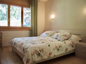 Postel nebo postele na pokoji v ubytování Résidence RoyAlp - Appartement 22A